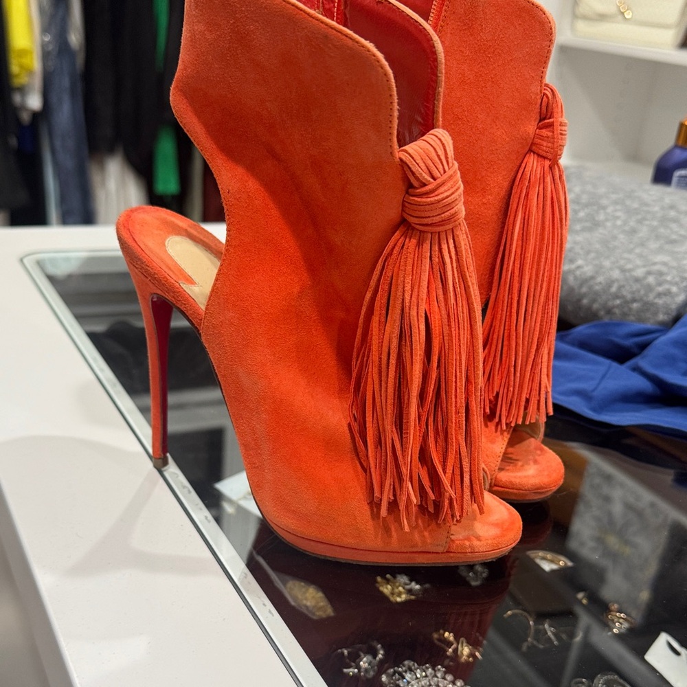 Authentic Christian louboutin  Orange Tassel heels